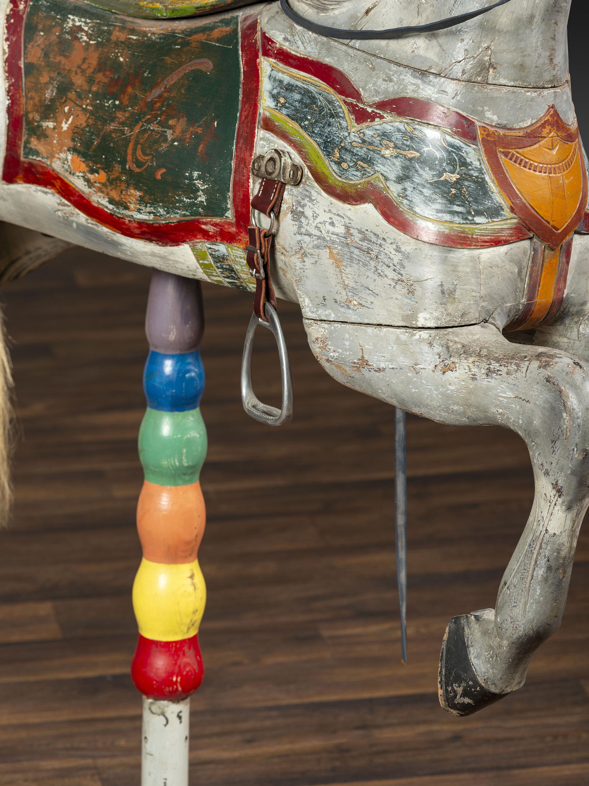 A Herschell-Spillman Carved and Painted Wood Carousel Horse