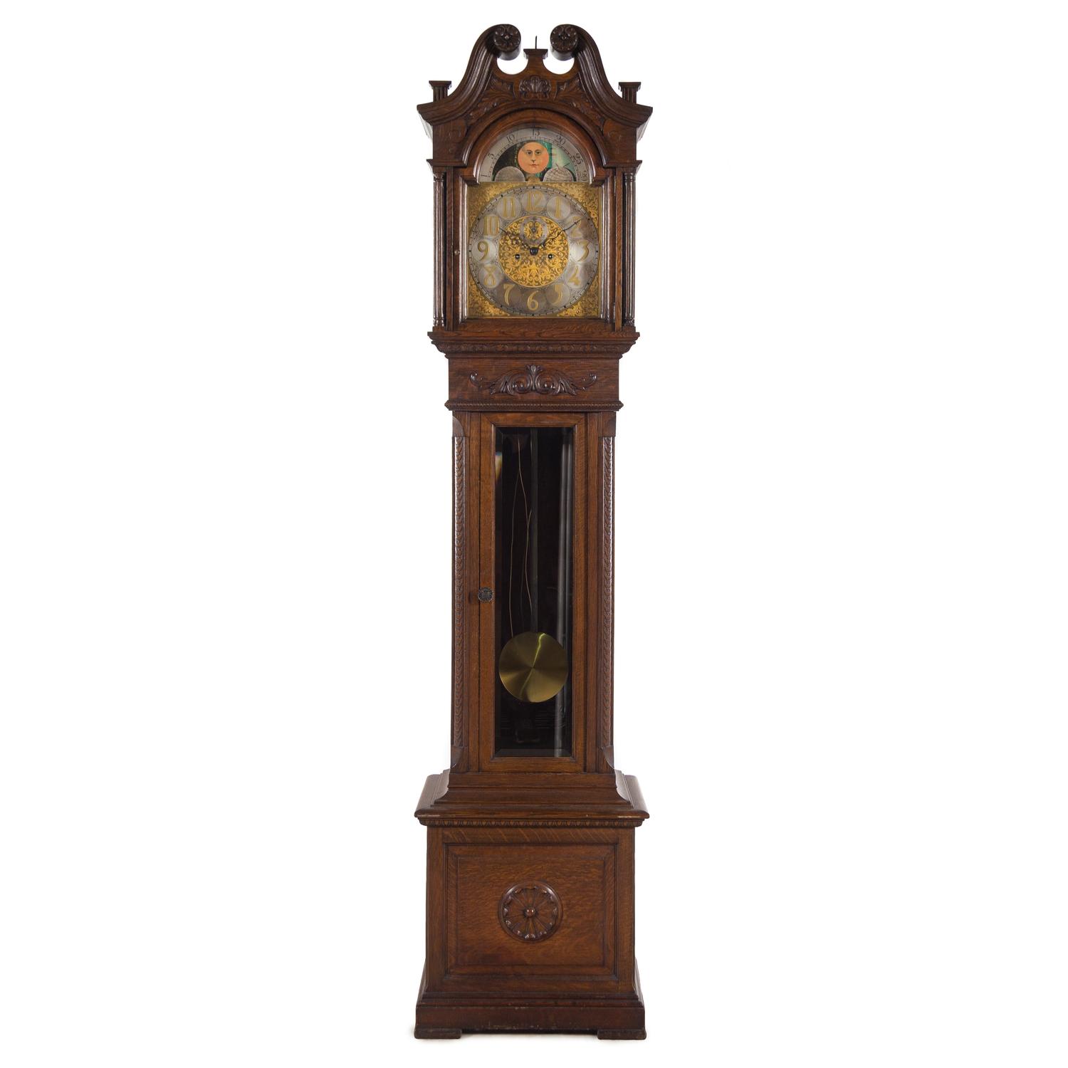 A Carved Oak Tall Case Clock