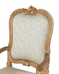 A Pair of Italian Rococo Painted and Parcel Gilt Armchairs