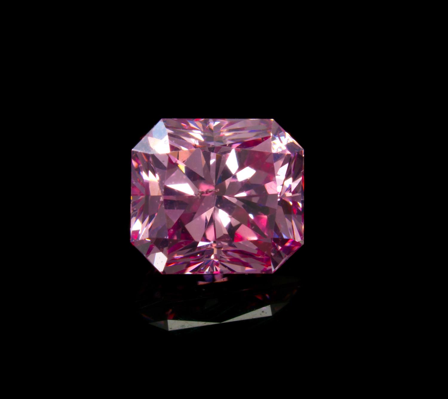 A 0.68 Carat Radiant Cut Fancy Intense Purplish Pink Diamond,