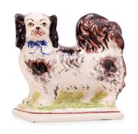 A Group of Eight Staffordshire Pottery Figures
