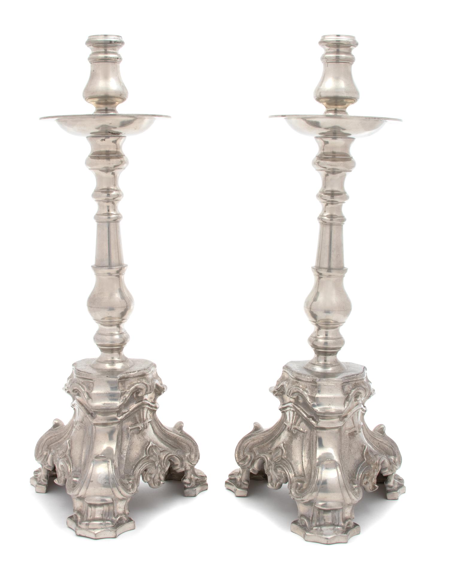 A Pair of English Silverplate Candlesticks Height 17 inches. — 19TH CENTURY