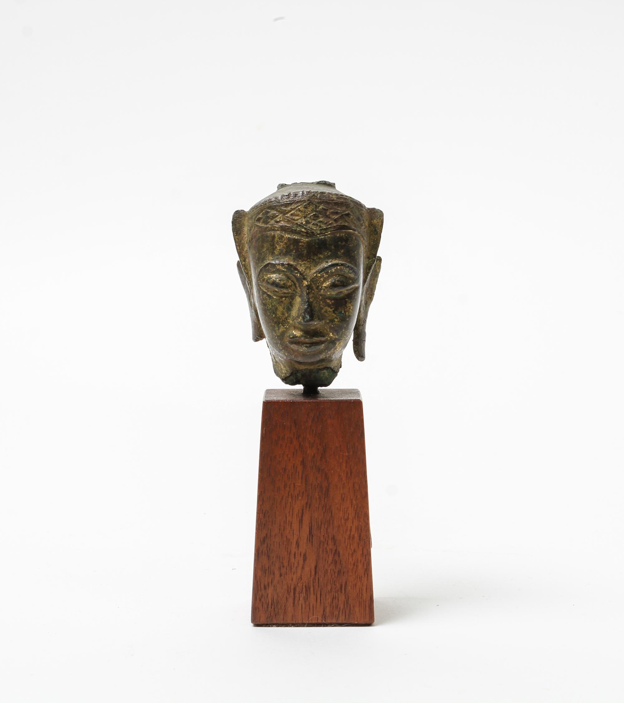 A Thai Gilt Bronze Head of Buddha Height of bronze 2 1/2 inches.