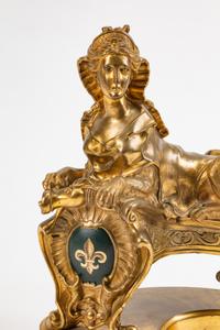 A Pair of Régence Style Gilt-Bronze Sphinx-Form Chenets — 19TH CENTURY