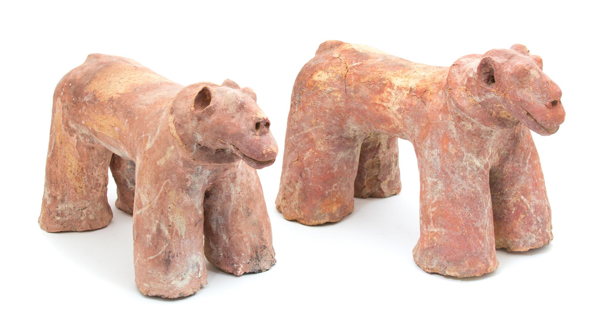 A Pair of Terracotta Models of Dogs Height 12 1/2 inches.