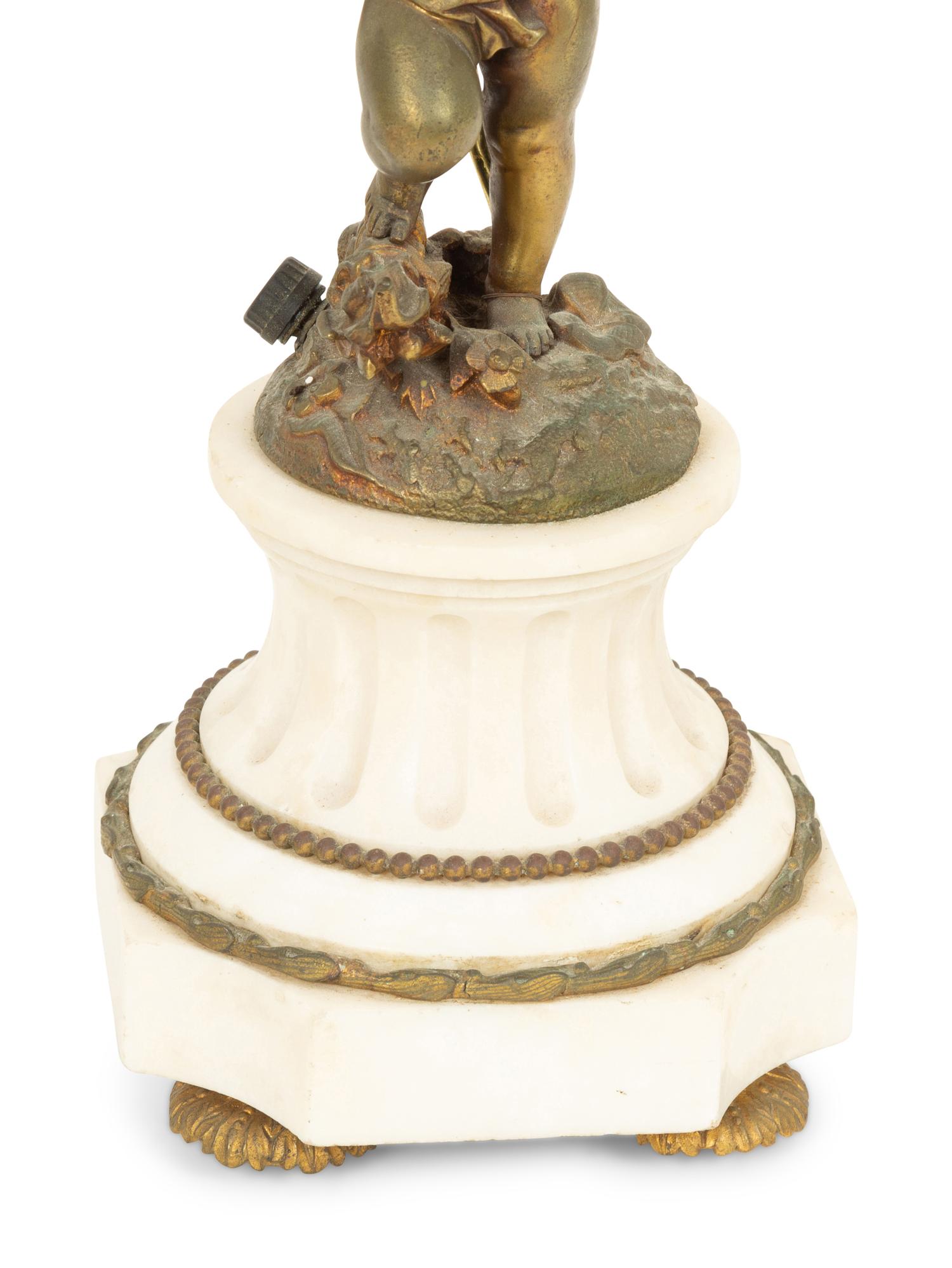 A Pair of Louis XVI Style Gilt Bronze and Marble Four-Light Candelabra