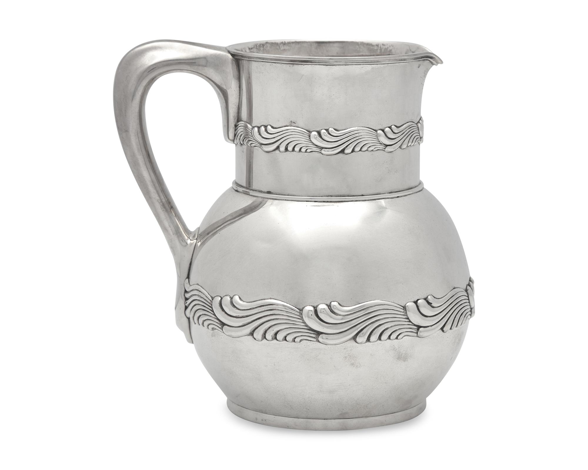 A Sterling Silver "Wave" Repousse Water Pitcher, Tiffany & Co., New York, NY, Circa 1880