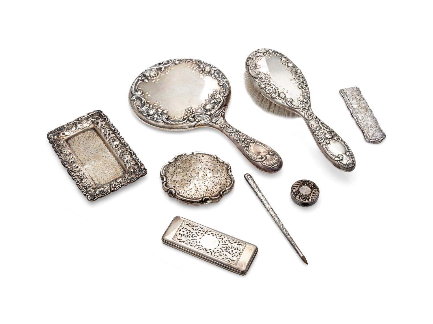 An Assembled Silver and Silver-Plate Dresser Set
