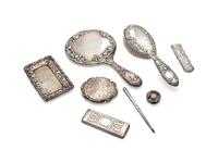 An Assembled Silver and Silver-Plate Dresser Set