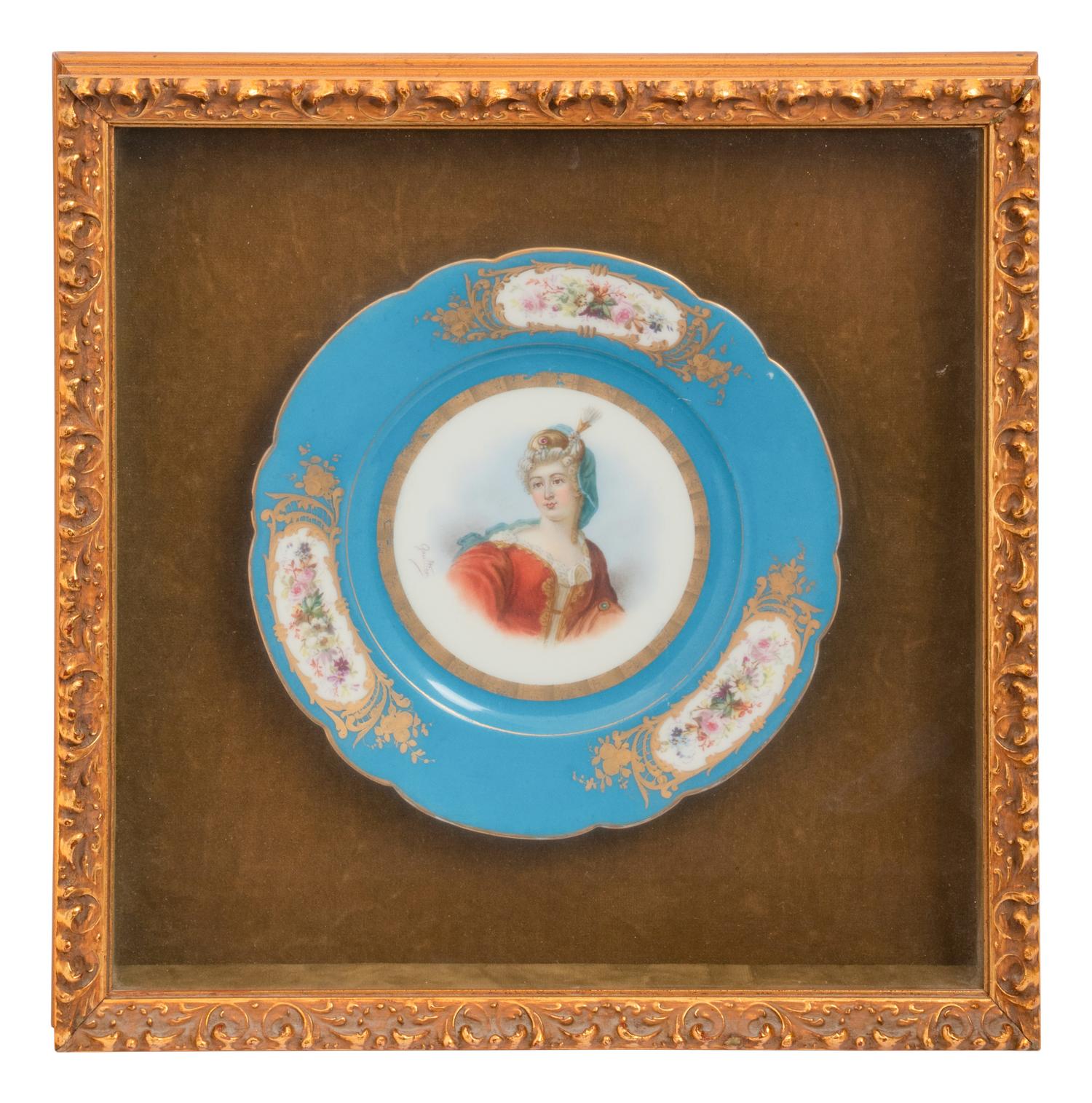 A Group of Seven Framed Sèvres Style Porcelain Plates