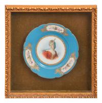 A Group of Seven Framed Sèvres Style Porcelain Plates