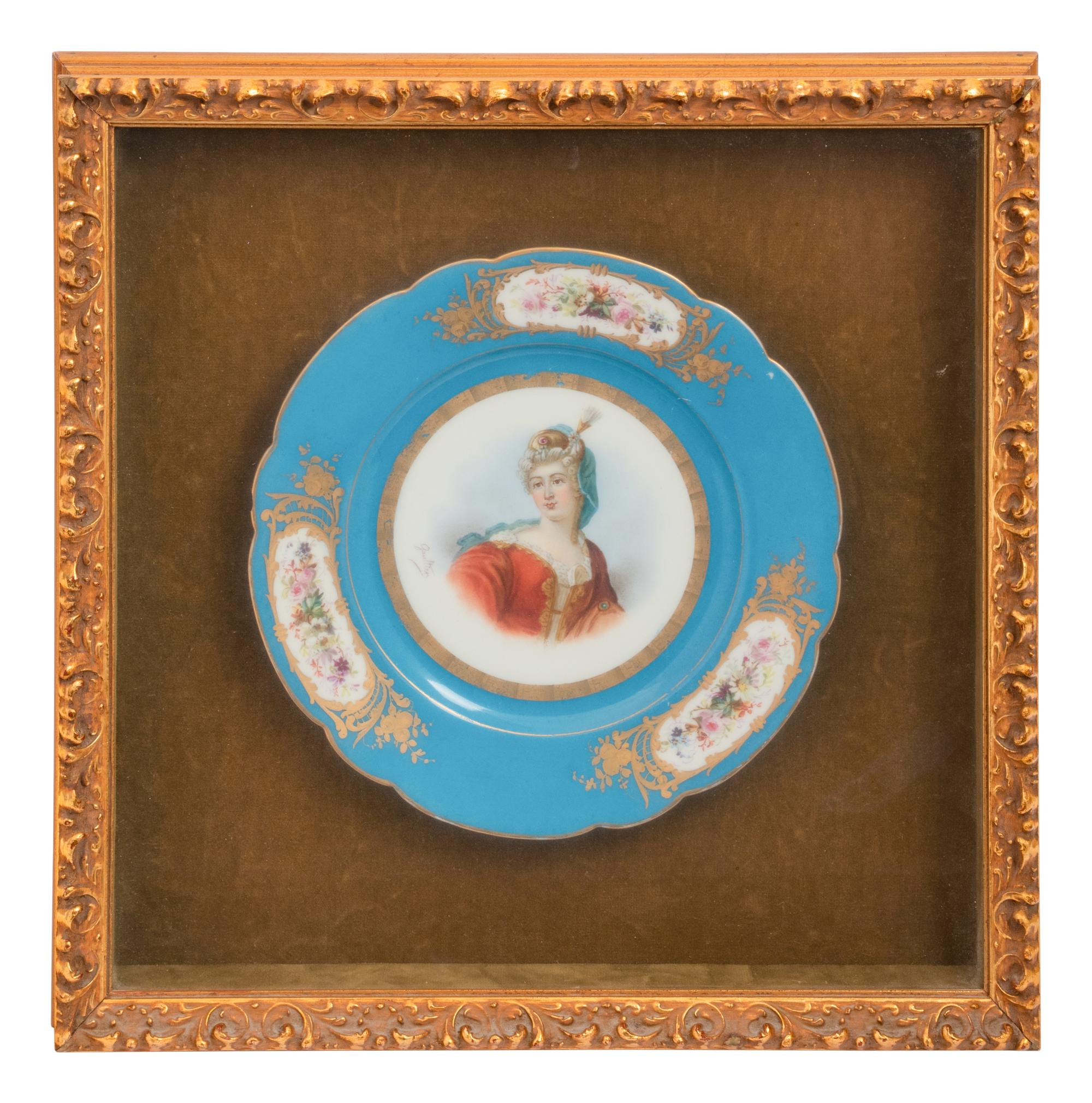 A Group of Seven Framed Sèvres Style Porcelain Plates