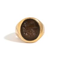 A Roman Carnelian Ring Stone with a Satyr Mixing Wine — Set in a gold ring