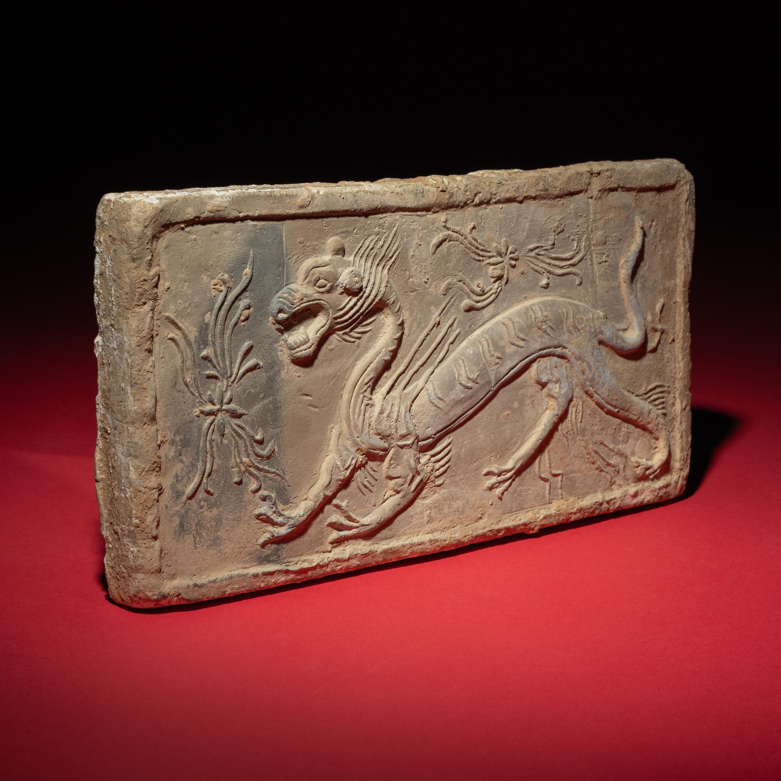 A Chinese Grey Pottery 'White Tiger' Relief Tomb Brick, Southern Dynasties — 南朝 灰陶四神白虎畫像磚
