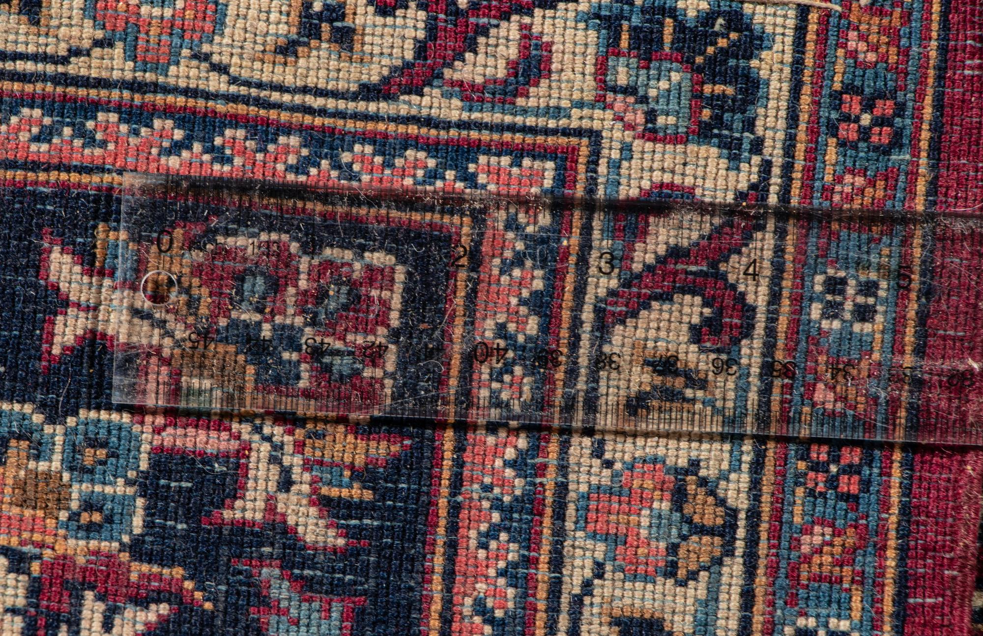 A Kashan Wool Rug