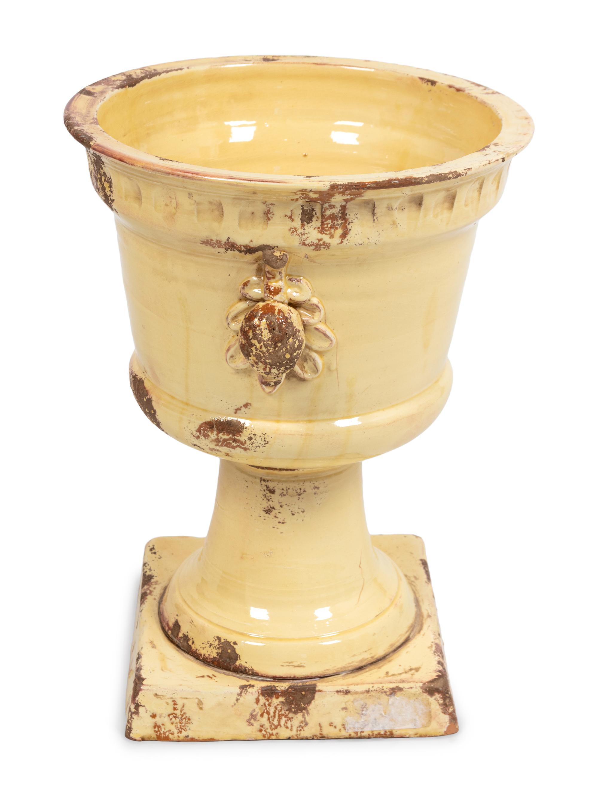 An Italian White Glazed Terracotta Urn