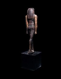 An Egyptian Wood Striding Montu
