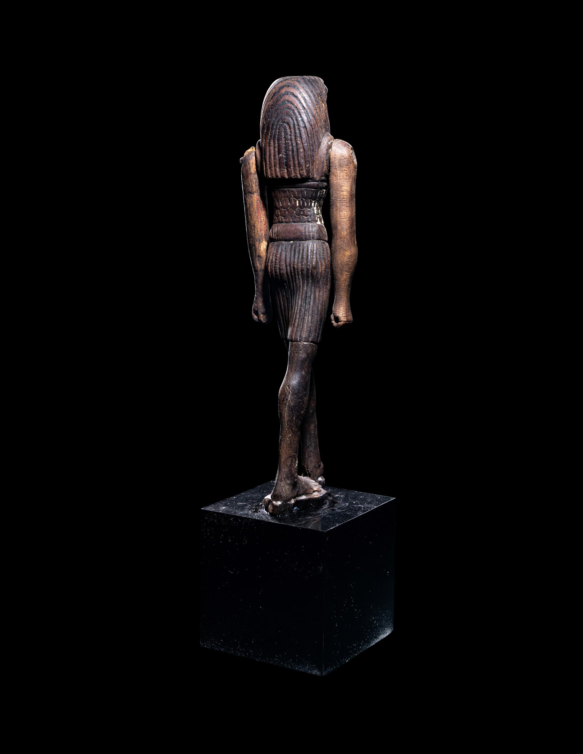 An Egyptian Wood Striding Montu