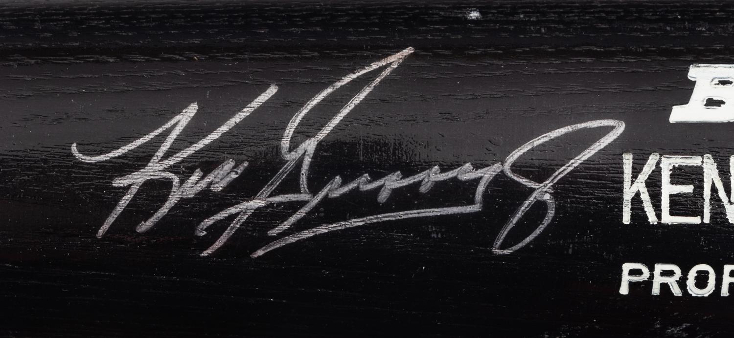 A Group of Baseball Bats Formerly Displayed at Mike Ditka's Restaurant (Including Ken Griffey Jr. and Hank Aaron Signed),