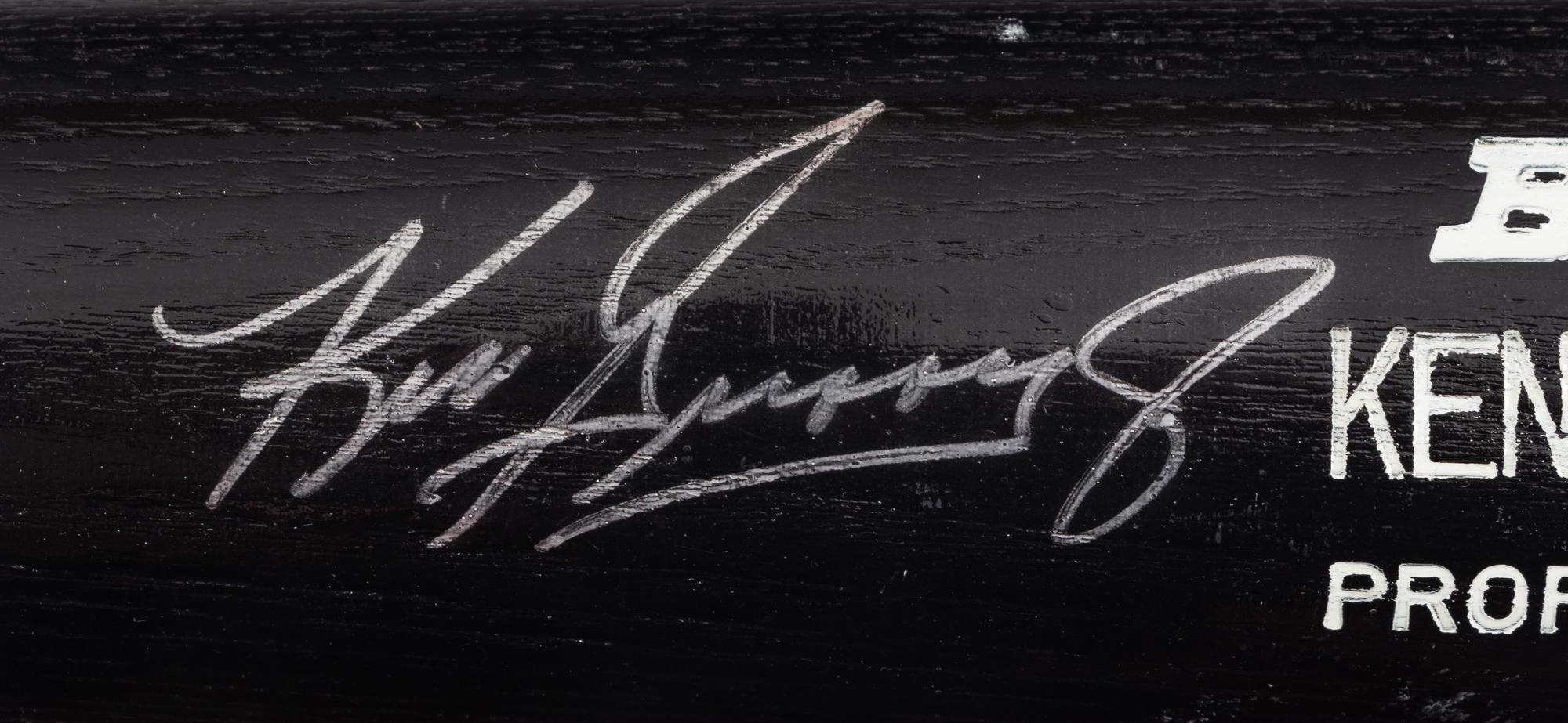 A Group of Baseball Bats Formerly Displayed at Mike Ditka's Restaurant (Including Ken Griffey Jr. and Hank Aaron Signed),