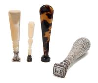 A Collection of Four Seals, Height of tallest 4 3/8 inches.