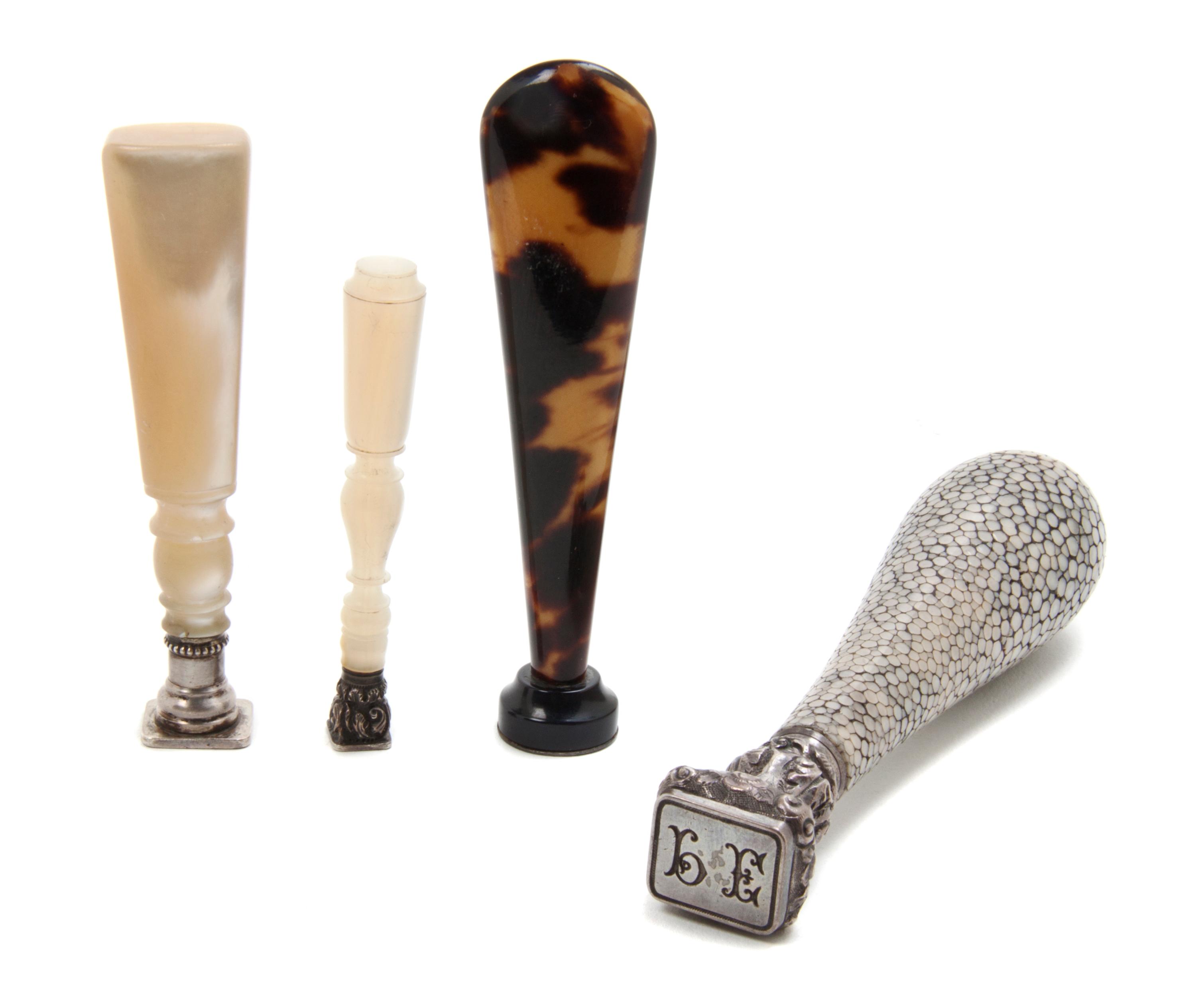 A Collection of Four Seals, Height of tallest 4 3/8 inches.