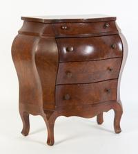 A Continental Diminutive Bombe Commode Height 20 3/8 x width 18 1/2 x depth 10 inches.