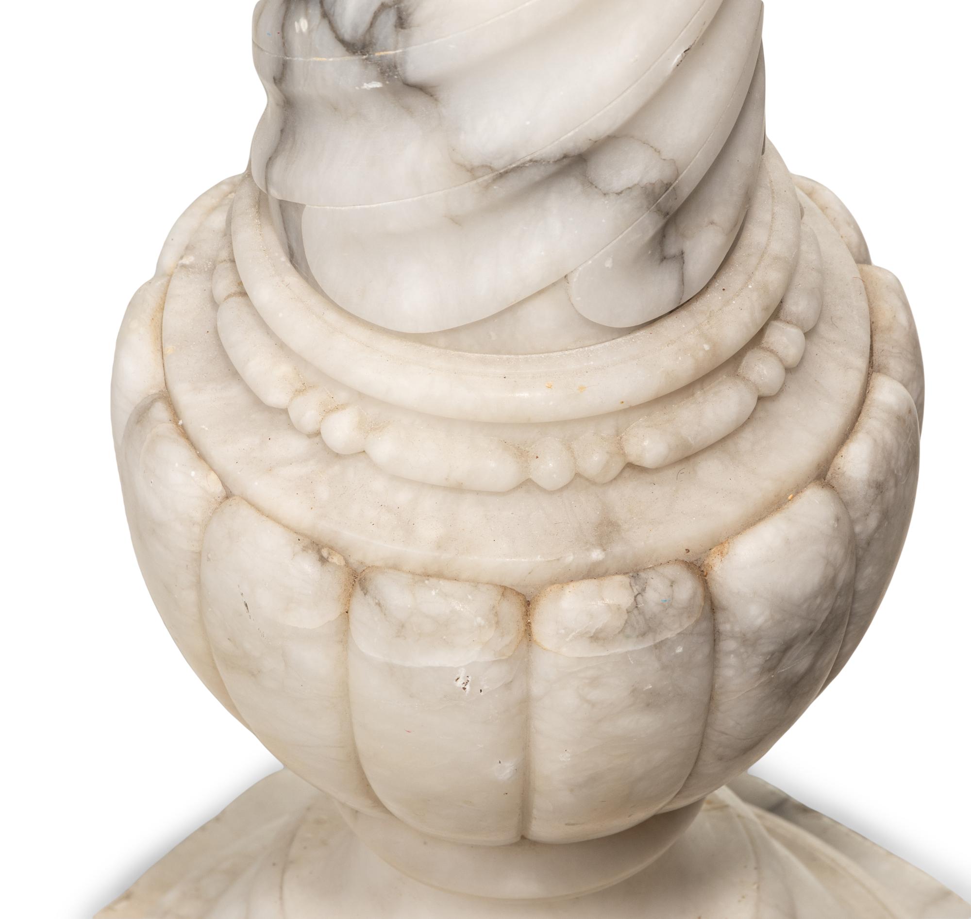 A Continental Carved Marble Pedestal