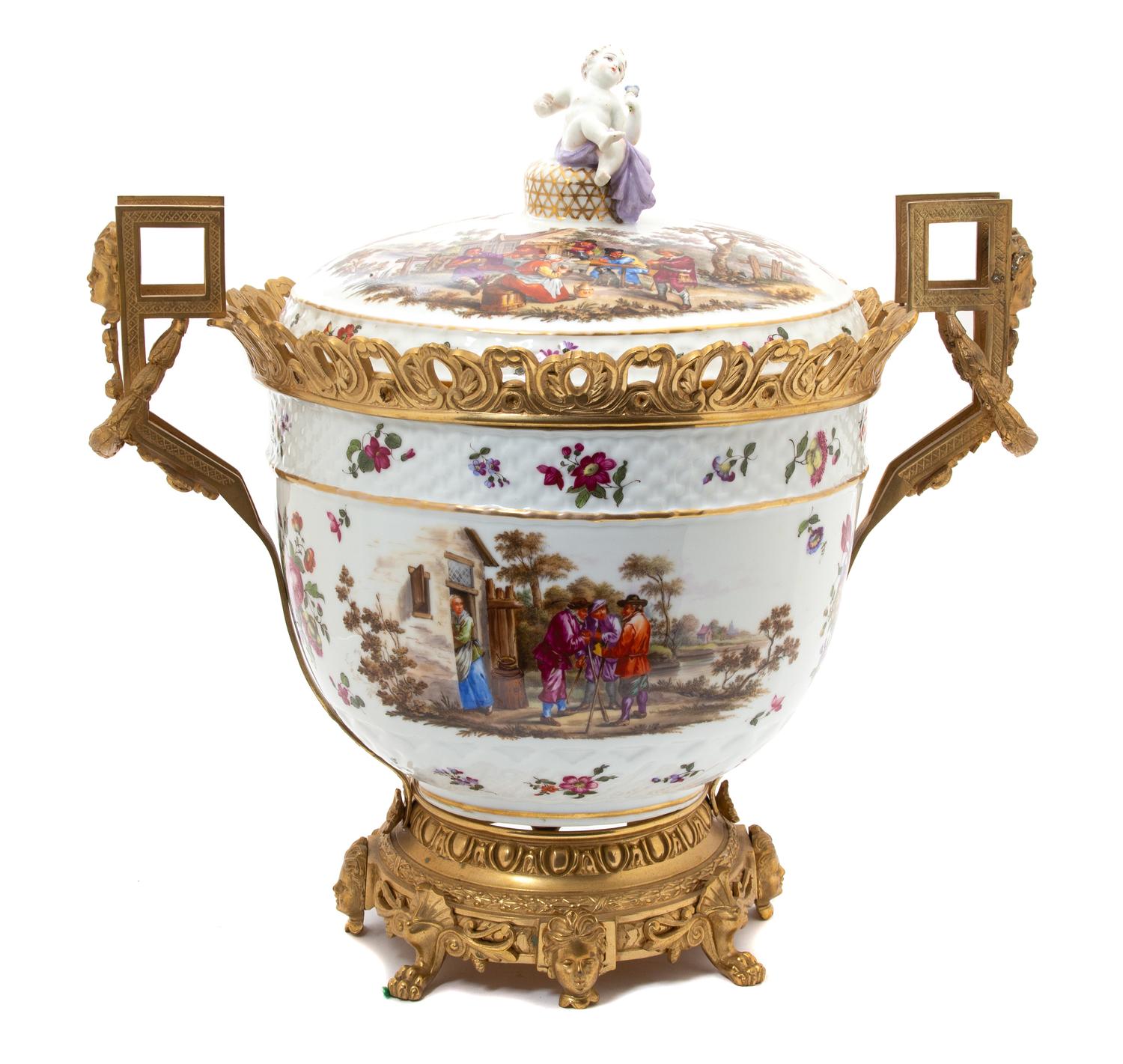 A Gilt Bronze Mounted German Porcelain Urn and Cover Height 20 inches. — 19TH CENTURY