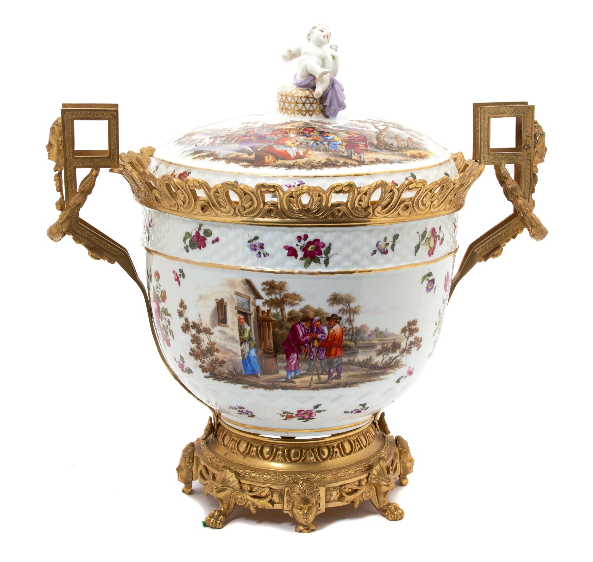 A Gilt Bronze Mounted German Porcelain Urn and Cover Height 20 inches. — 19TH CENTURY