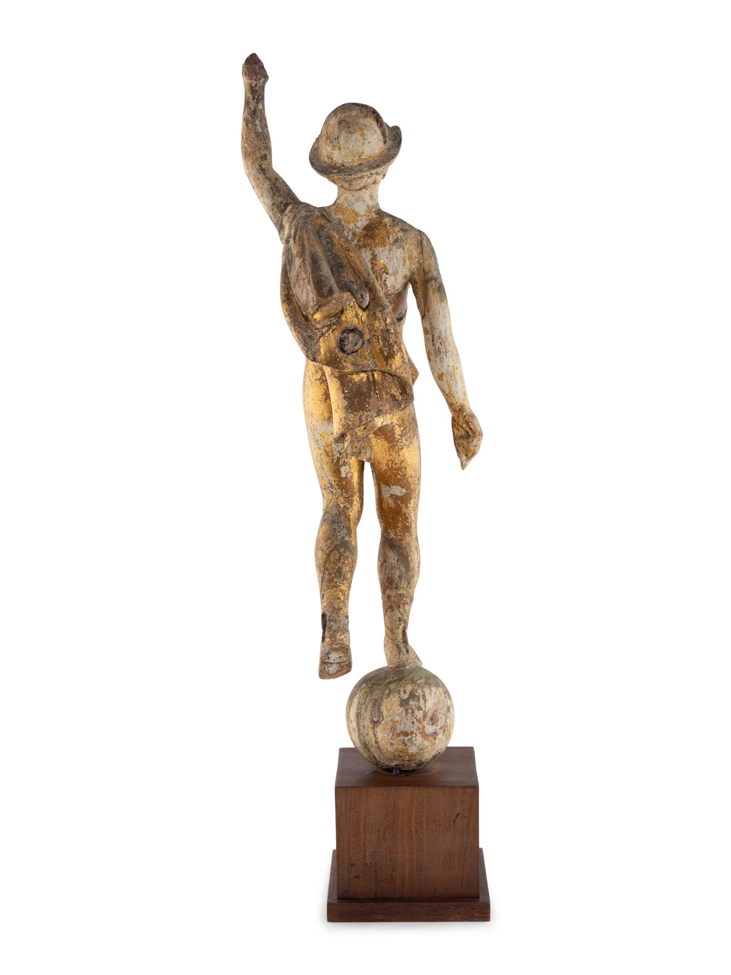 A Carved and Parcel Gilt Figure of Mercury