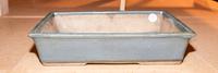 A Glazed Ceramic Bulb Dish. Width 14 1/4 inches.