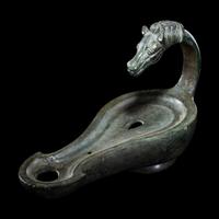 A Roman Bronze Horse Head Oil Lamp