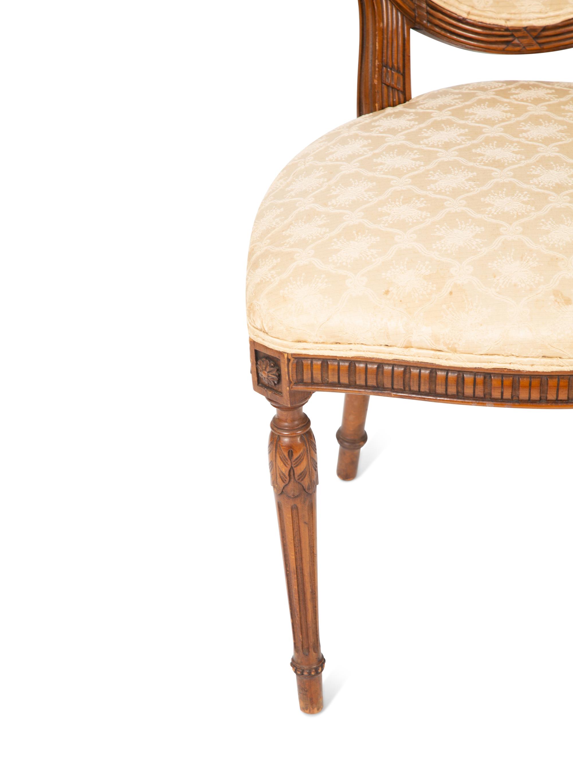 A Set of Four Louis XVI Style Side Chairs