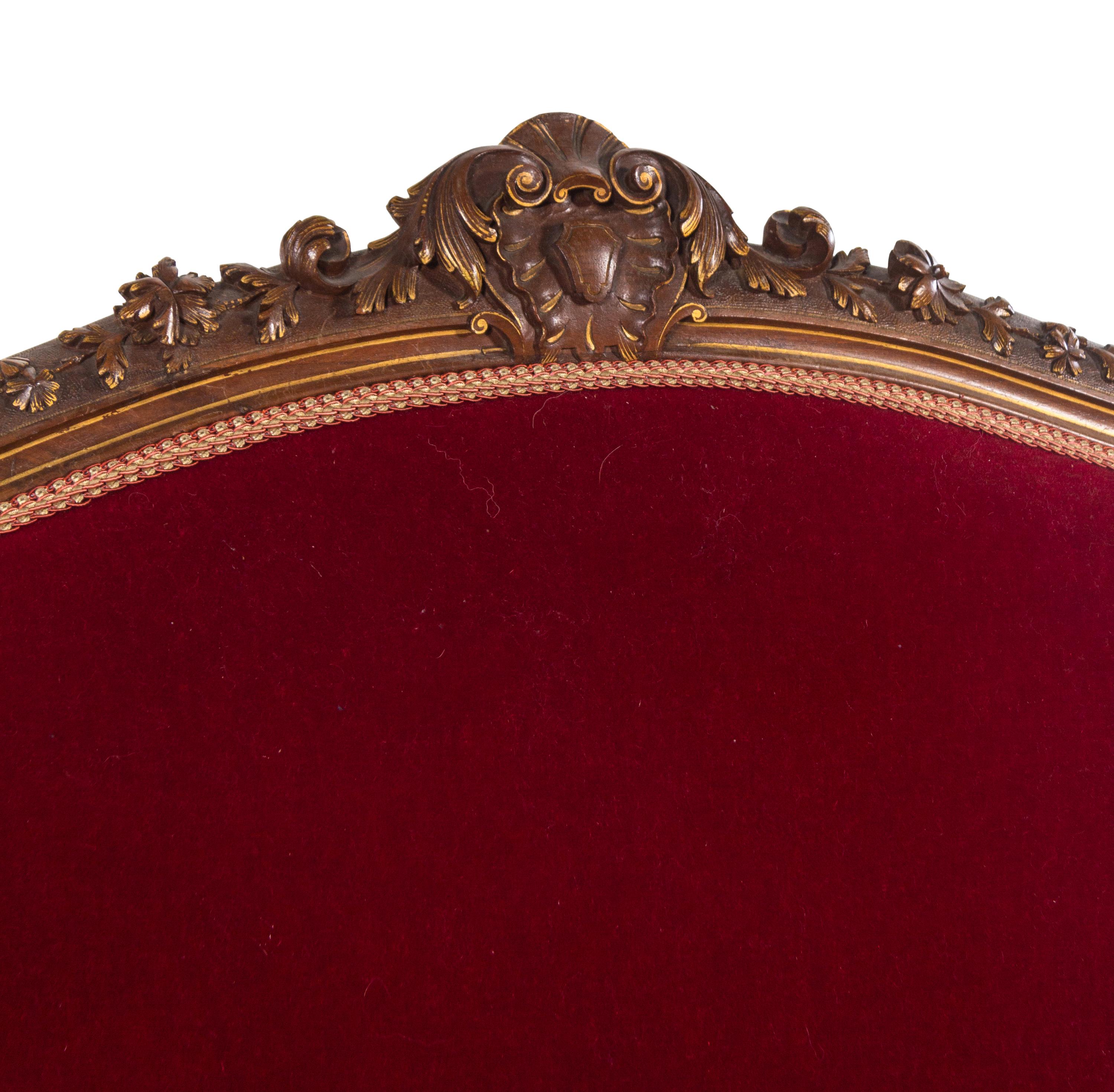 An Italian Louis XV Style Carved and Parcel Gilt Walnut Parlor Suite