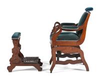 An Archer Velvet Upholstered Goose Neck Walnut Barber Chair and Footstool