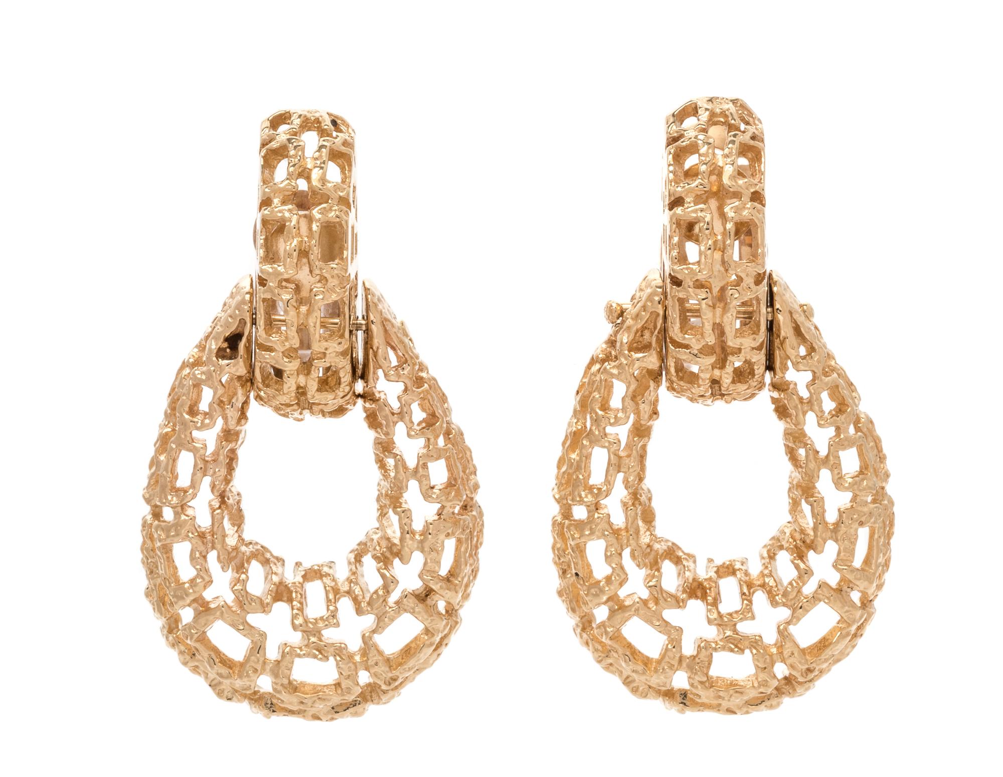 A Pair of 14 Karat Yellow Gold Earclips, 17.60 dwts.