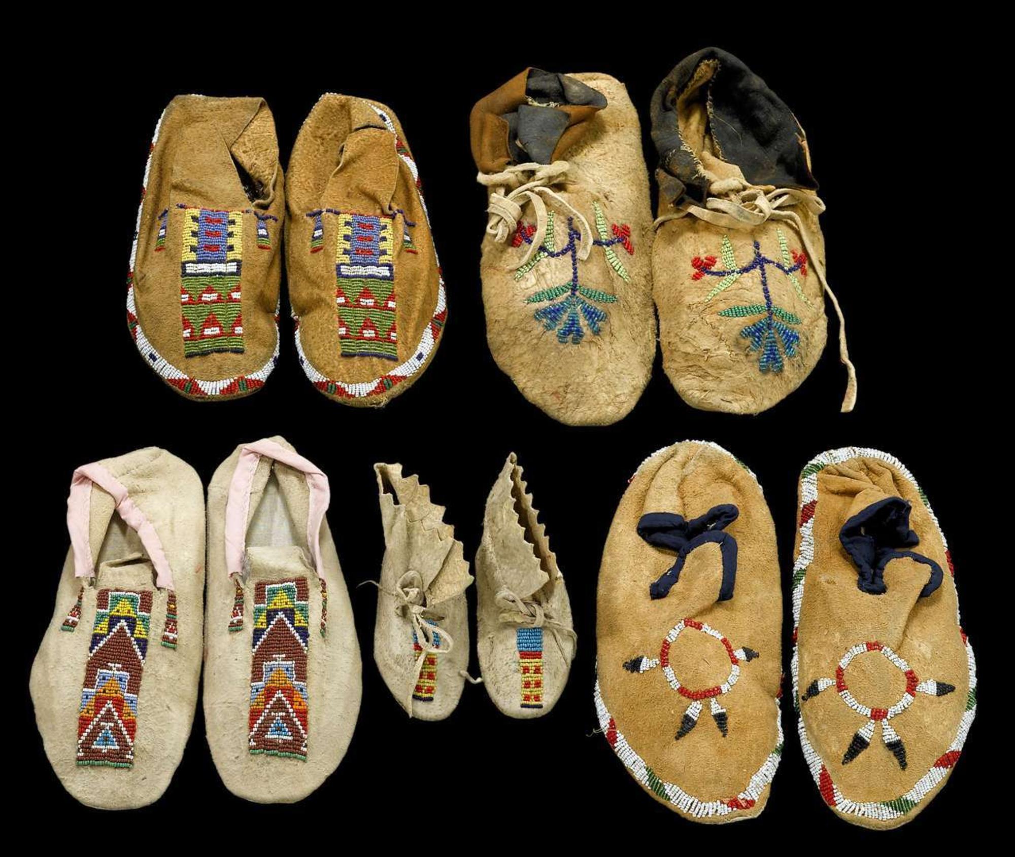 Group of five Plains beaded hide moccasins north and south dakota, first half 20th century