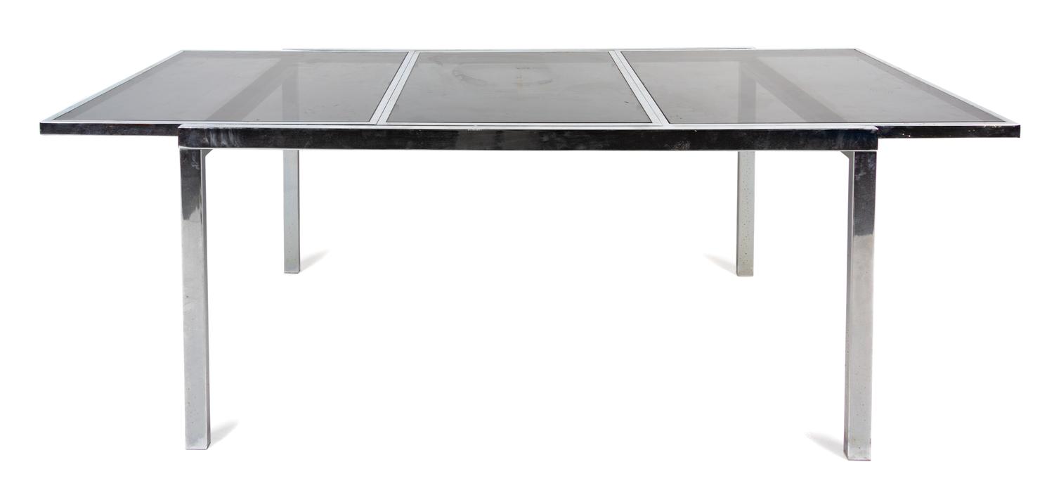 A Chrome Extension Dining Table — SECOND HALF 20TH CENTURY