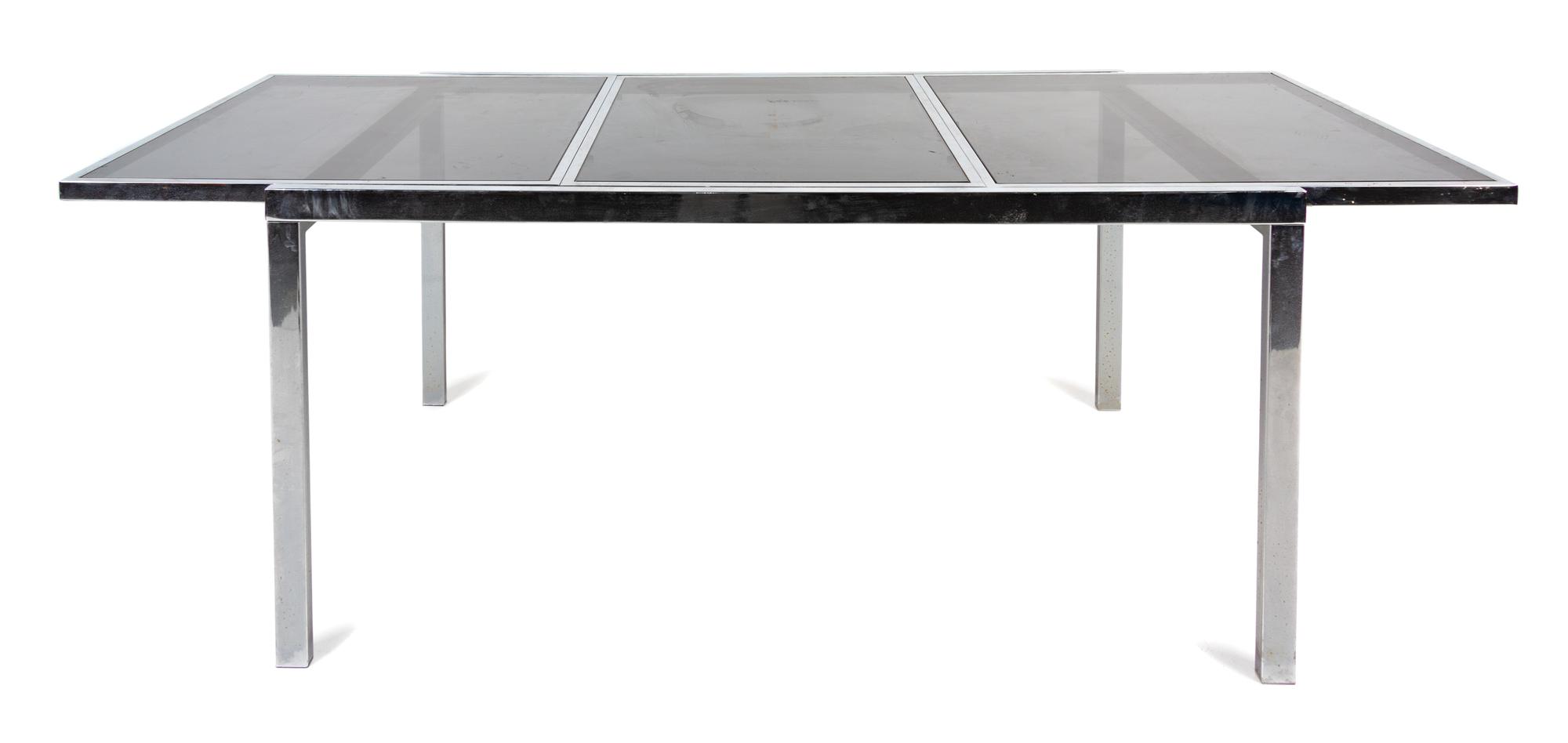A Chrome Extension Dining Table — SECOND HALF 20TH CENTURY