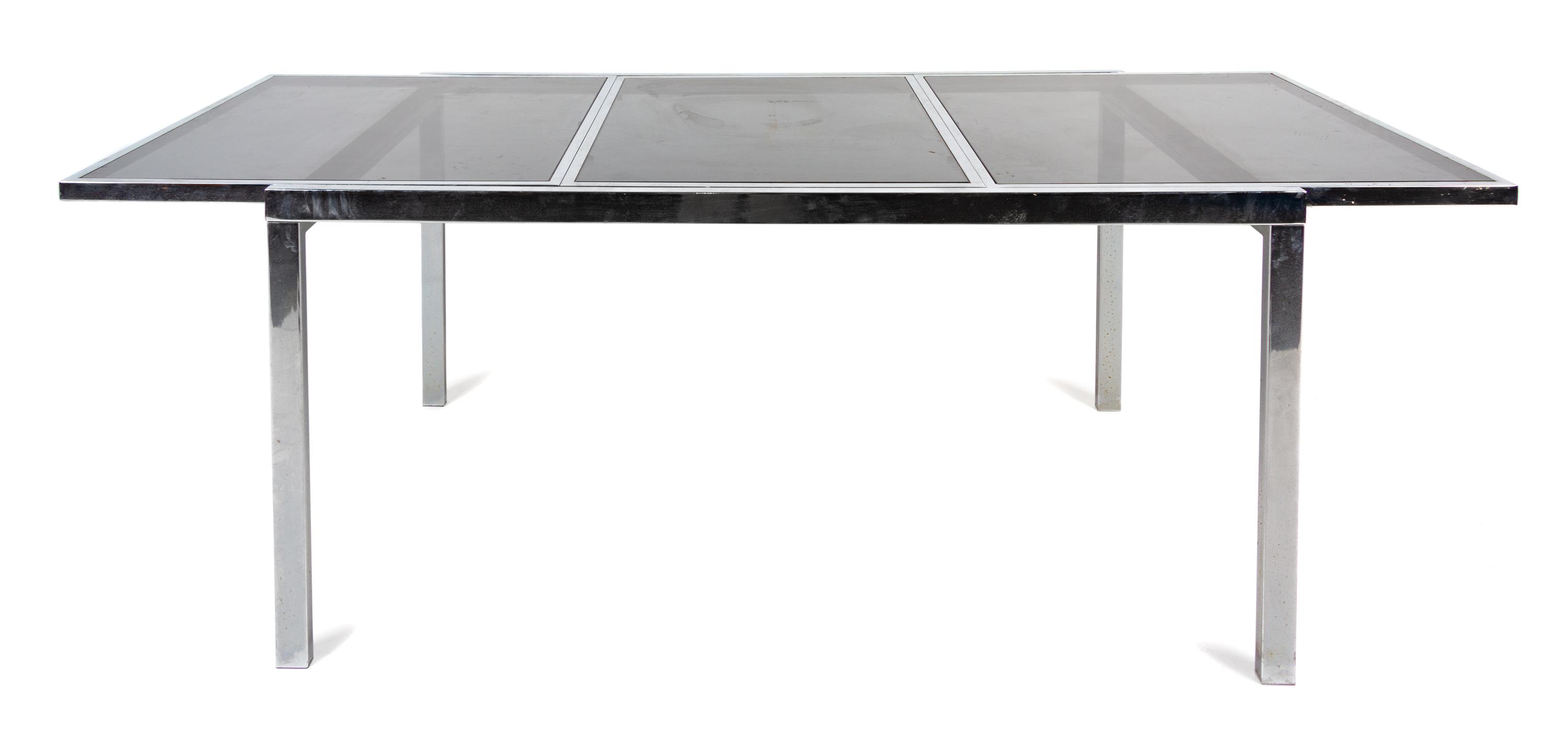 A Chrome Extension Dining Table — SECOND HALF 20TH CENTURY