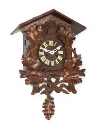 A Black Forest Carved Cuckoo Clock