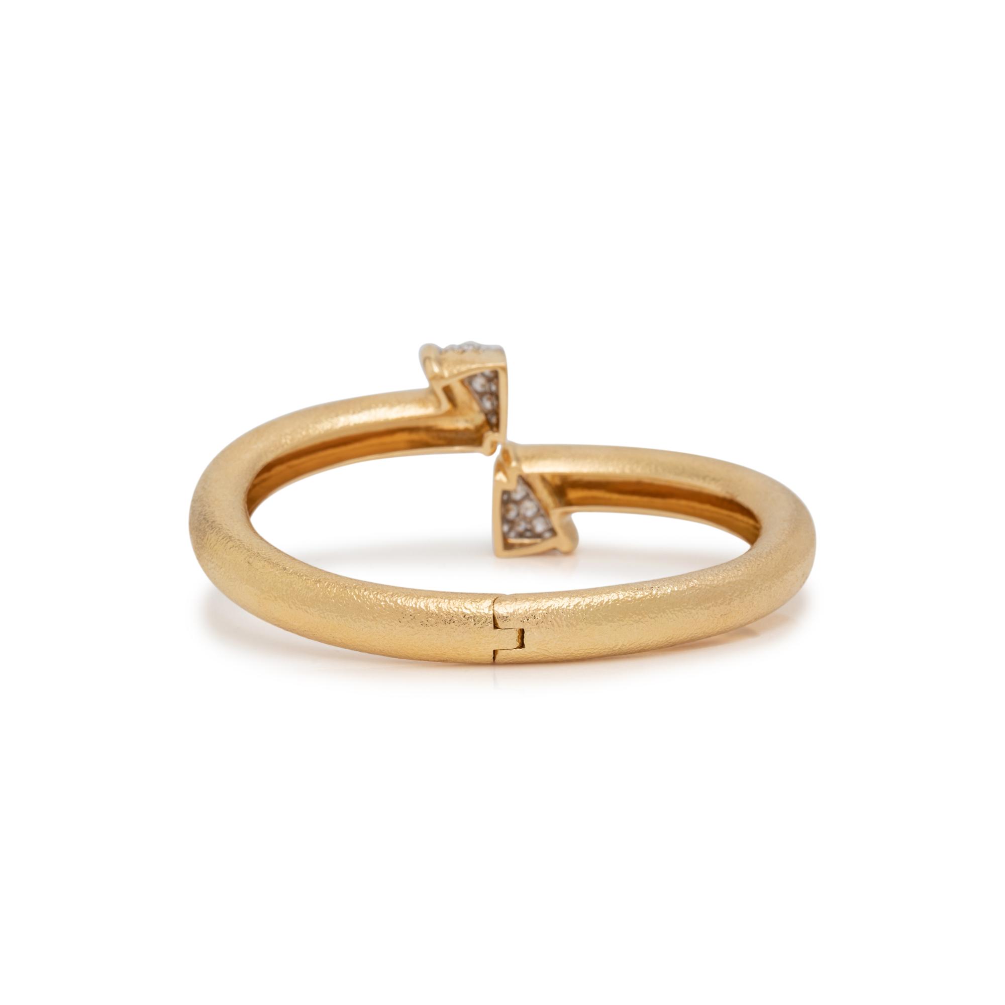 DAVID WEBB, YELLOW GOLD AND DIAMOND BANGLE BRACELET
