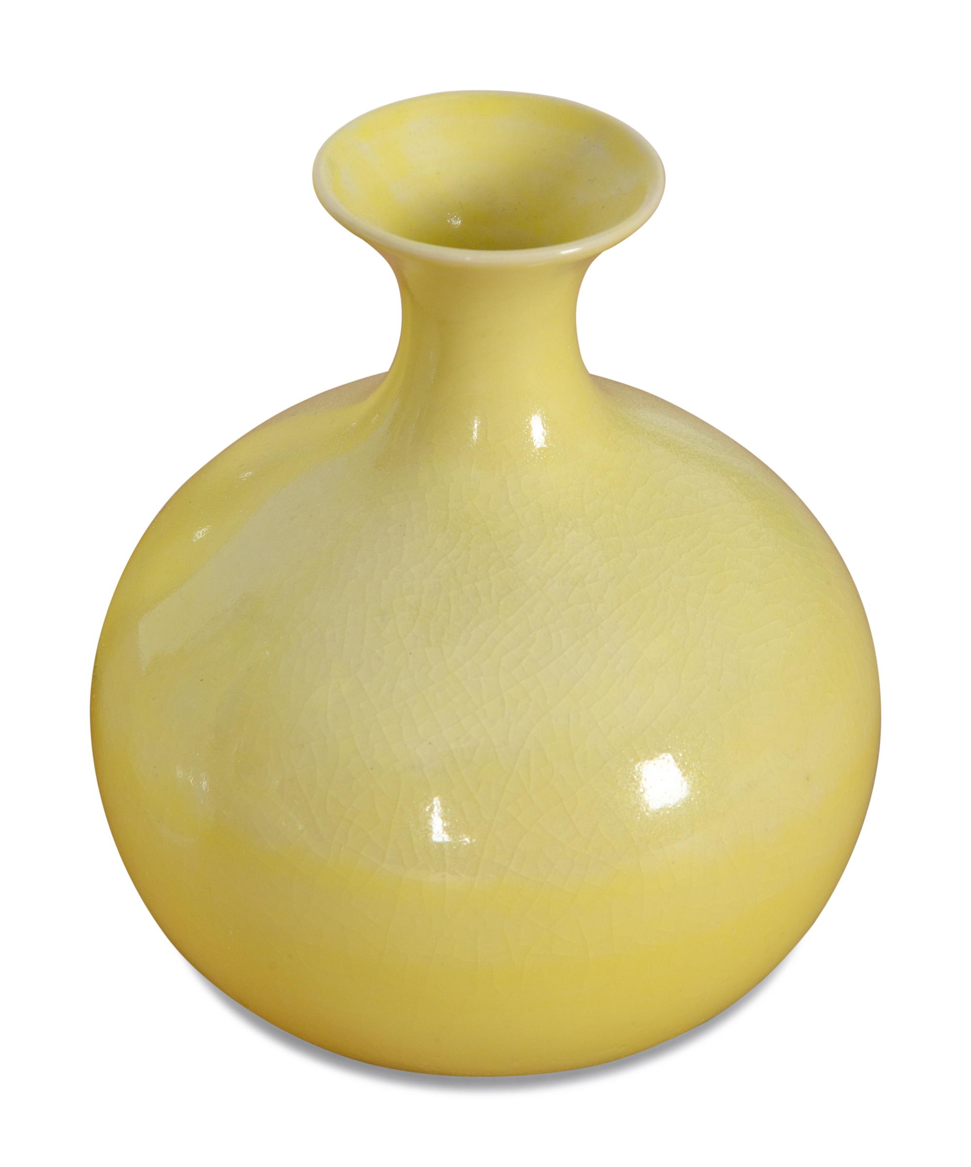 A Collection of Yellow Glazed Porcelain Articles