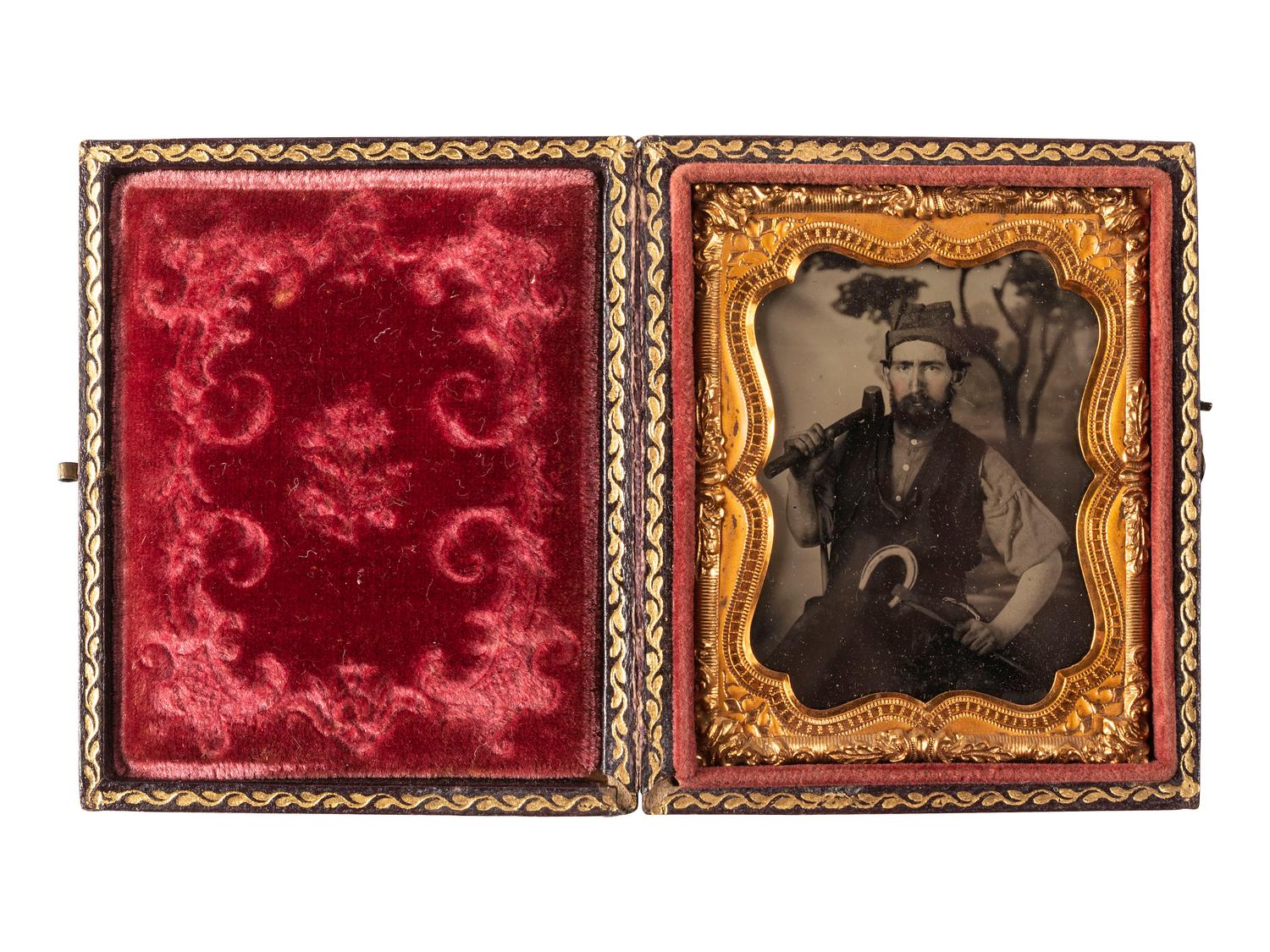[EARLY PHOTOGRAPHY]. Ninth plate occupational ambrotype of a blacksmith.