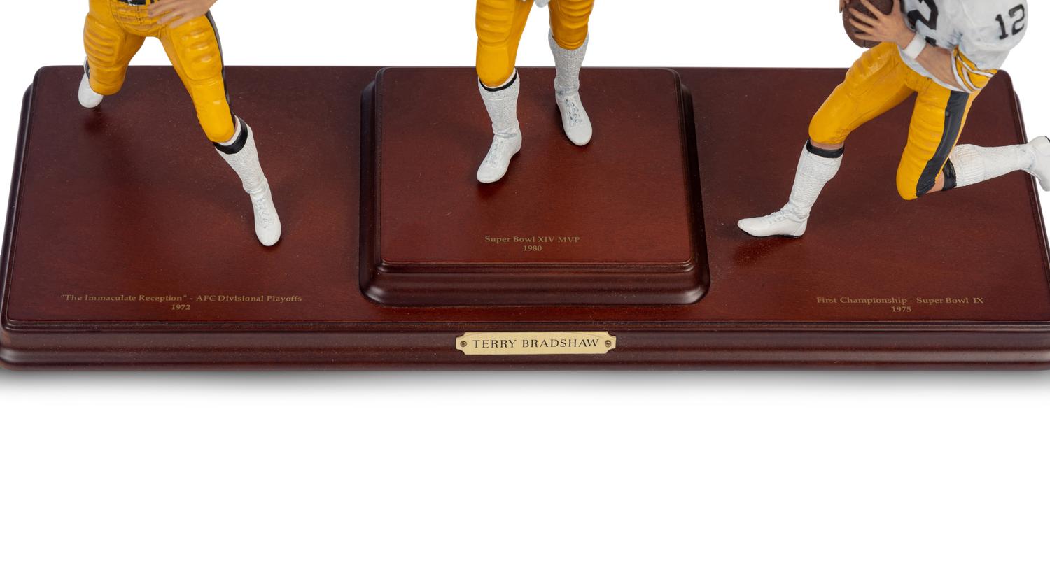A Terry Bradshaw Pittsburgh Steelers Danbury Mint Figurine Display,