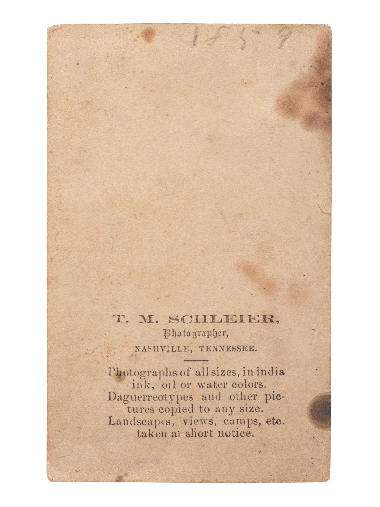 [EARLY PHOTOGRAPHY]. SCHLEIER, T.M., photographer. CDV of an African American nanny holding a white baby. Nashville, TN.