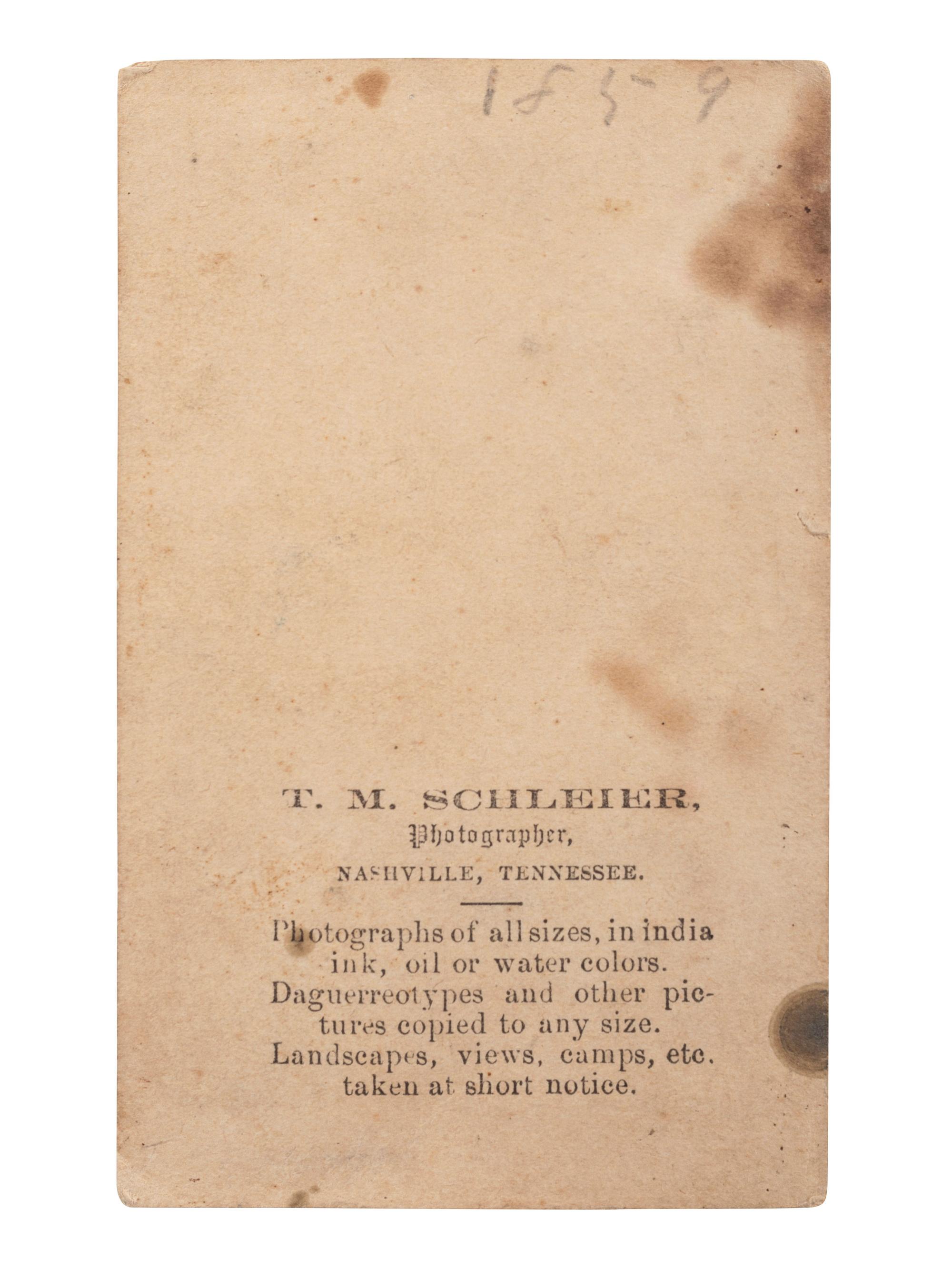 [EARLY PHOTOGRAPHY]. SCHLEIER, T.M., photographer. CDV of an African American nanny holding a white baby. Nashville, TN.