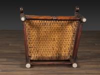 A William and Mary Style Parcel Gilt and Red Painted, Fan-Carved Bannister Back Woven Splint Seat Armchair