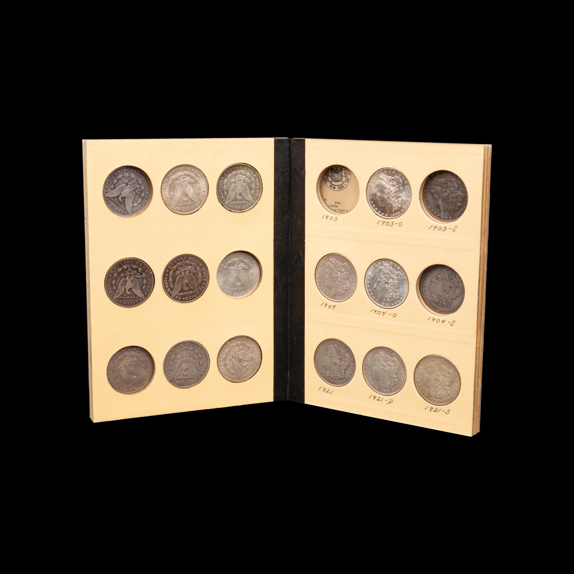 A Collection of Seventy Morgan Silver Dollars